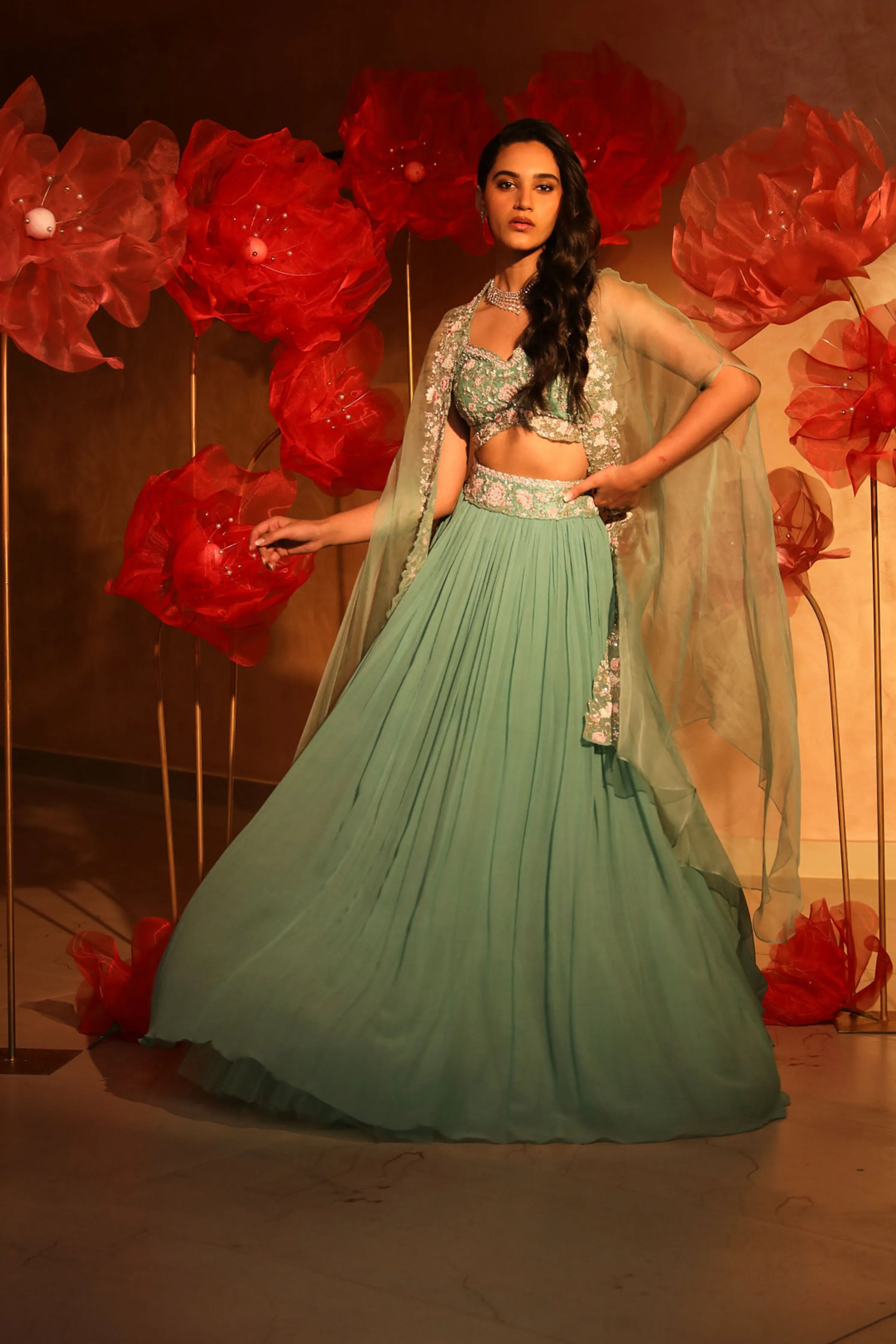 Ablaze agate green lehenga and cape set